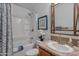 Bathroom with a bathtub, shower, a sink with stylish faucet, and decorative artwork at 650 N Hawes Rd # 4128, Mesa, AZ 85207