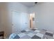 Bedroom with a comfy bed, closet, and natural lighting at 650 N Hawes Rd # 4128, Mesa, AZ 85207