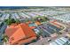 Overhead view of a sparkling community pool, surrounded by beautiful palm trees and ample parking. An inviting community space at 650 N Hawes Rd # 4128, Mesa, AZ 85207