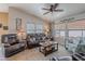 Spacious living room with ceiling fan, and comfortable furniture for relaxing or entertaining at 650 N Hawes Rd # 4128, Mesa, AZ 85207