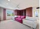 Cozy living room with built-in shelving, plush seating, and natural light at 6997 E Paradise Ranch Rd, Paradise Valley, AZ 85253