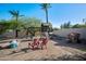 Backyard playground with a swing set, slide, and playhouse; the perfect space for to play outdoors at 6997 E Paradise Ranch Rd, Paradise Valley, AZ 85253