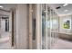 Walk-in closet with custom storage solutions and ample space for clothing at 6997 E Paradise Ranch Rd, Paradise Valley, AZ 85253