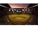 Chase Field aerial showcasing a vast baseball diamond with evening skies, a packed stadium, and jumbotron display at 706 E Washington St # 207, Phoenix, AZ 85034