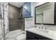 Charming bathroom featuring stylish fixtures, a bathtub, and a vanity at 706 E Washington St # 207, Phoenix, AZ 85034