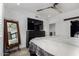 Spacious bedroom featuring closet, mirror, and comfortable bedding at 706 E Washington St # 207, Phoenix, AZ 85034