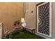Charming entryway with unique door design and cozy outdoor seating at 706 E Washington St # 207, Phoenix, AZ 85034