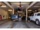 Spacious garage featuring ample storage racks, shelving, and a new garage door opener at 706 E Washington St # 207, Phoenix, AZ 85034