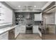 Stylish kitchen featuring stainless steel appliances and sleek gray subway tile backsplash at 706 E Washington St # 207, Phoenix, AZ 85034