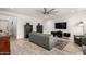 Living room featuring tiled floors, a ceiling fan, recessed lighting, and neutral decor at 706 E Washington St # 207, Phoenix, AZ 85034