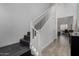 Elegant staircase leading to the upper level of the home at 706 E Washington St # 207, Phoenix, AZ 85034