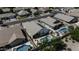 A beautiful aerial view of a home with a private pool and solar panels in a residential neighborhood at 7832 E Osage Ave, Mesa, AZ 85212