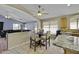 Bright kitchen featuring stainless steel appliances and a breakfast nook dining area at 7832 E Osage Ave, Mesa, AZ 85212
