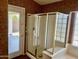 Shower and exterior access in this unique bathroom at 830 E Dry Creek Rd, San Tan Valley, AZ 85143