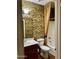 Bathroom featuring decorative wallpaper, a shower/tub, and an integrated vanity at 830 E Dry Creek Rd, San Tan Valley, AZ 85143