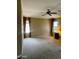 Spacious bedroom with large windows, neutral walls, and carpet flooring at 830 E Dry Creek Rd, San Tan Valley, AZ 85143