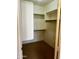 Walk-in closet with shelving and ample storage space at 830 E Dry Creek Rd, San Tan Valley, AZ 85143