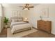 Cozy bedroom featuring neutral tones, a comfortable bed, and modern furnishings at 8725 E Coronado Rd, Scottsdale, AZ 85257