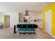Modern kitchen with stainless appliances, central island with seating, and ample countertops at 8725 E Coronado Rd, Scottsdale, AZ 85257