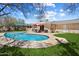Enjoy this private backyard swimming pool with grassy area and patio space at 8725 E Coronado Rd, Scottsdale, AZ 85257
