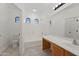 Bathroom with a bathtub, toilet, and vanity at 8745 W Windsor Dr, Peoria, AZ 85381