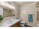 Bathroom featuring a single sink vanity, tiled shower, and neutral decor at 9625 W Mountain View Rd # A, Peoria, AZ 85345