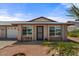Charming single story home with a brick facade, large windows, and well-maintained landscaping at 9625 W Mountain View Rd # A, Peoria, AZ 85345