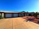 Charming single-story home featuring a two-car garage, landscaped front yard, and a welcoming entrance at 9625 W Mountain View Rd # A, Peoria, AZ 85345
