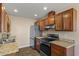 Well-equipped kitchen featuring stainless steel appliances, granite countertops, and modern cabinets at 9625 W Mountain View Rd # A, Peoria, AZ 85345