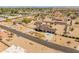 Expansive aerial view of a desert home featuring a large lot, mature landscaping within a community at 11119 W Mountain View Rd, Sun City, AZ 85351