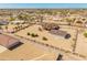 Aerial view showing the house, detached garage, and surrounding desert landscape at 11119 W Mountain View Rd, Sun City, AZ 85351