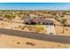 Aerial view of the home highlighting its well-manicured grounds, beautiful desert landscaping, and spacious surroundings at 11119 W Mountain View Rd, Sun City, AZ 85351