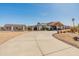 Beautiful desert home featuring a long driveway, mature landscaping, and desert style landscaping at 11119 W Mountain View Rd, Sun City, AZ 85351