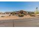 Beautiful home with desert landscaping, a unique entrance, and a spacious driveway at 11119 W Mountain View Rd, Sun City, AZ 85351