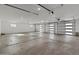 Spacious three-car garage with ample room for parking and storage at 11119 W Mountain View Rd, Sun City, AZ 85351