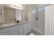 Bathroom features double vanity, granite counters, and walk-in shower at 1201 N 13Th St, Coolidge, AZ 85128