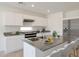 Bright kitchen features granite countertops, stainless appliances, and ample cabinet space at 1201 N 13Th St, Coolidge, AZ 85128