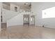 Spacious living room with high ceilings and an open floor plan at 16215 W Durango St, Goodyear, AZ 85338