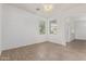 Spacious living room showcasing neutral paint, and a chandelier at 16215 W Durango St, Goodyear, AZ 85338