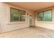 Covered patio with large windows providing a view of the back yard at 16215 W Durango St, Goodyear, AZ 85338