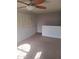 Room features shutters and neutral carpeting, awaiting personal touches at 2333 E Southern Ave # 2037, Tempe, AZ 85282