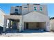 Two-story home featuring an attached carport and garage at 5041 E Umber Rd, San Tan Valley, AZ 85143