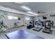 Spacious gym and workout space with a variety of exercise equipment and great lighting at 6705 E Des Moines St, Mesa, AZ 85205