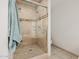 Tiled shower with glass door and dual shower heads in primary bath at 10380 E Cholla St, Scottsdale, AZ 85260