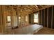 New construction bathroom framing with a modern tub and window for natural light at 11423 E Utah Ave, Mesa, AZ 85212