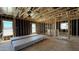 A new construction bedroom featuring wood framing, windows and OSB subfloor at 11423 E Utah Ave, Mesa, AZ 85212