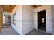 Unfinished new construction featuring a window and exterior door opening at 11423 E Utah Ave, Mesa, AZ 85212