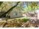 A well-maintained backyard features lush artificial grass and string lights, perfect for outdoor entertaining at 14114 W Surrey Dr, Surprise, AZ 85379