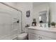 Clean and modern bathroom with a glass-enclosed shower and a bright vanity area at 14114 W Surrey Dr, Surprise, AZ 85379
