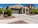 Inviting single-Gathering home with a spacious driveway, two-car garage, and well-maintained landscaping at 14114 W Surrey Dr, Surprise, AZ 85379